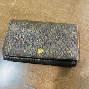 Pre-loved LV monogram medium Bi-fold wallet
